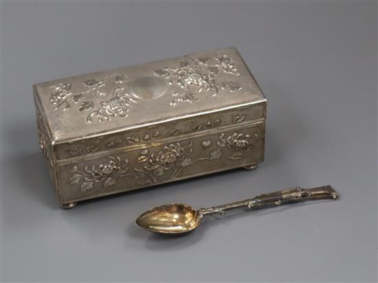 An early 20th century Chinese embossed white metal rectangular box and cover by Yok Sang and a plated rifle spoon.